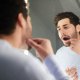 Root Canal Treatment - Man looking in the mirror - Alpha Dental Chester-le-Street